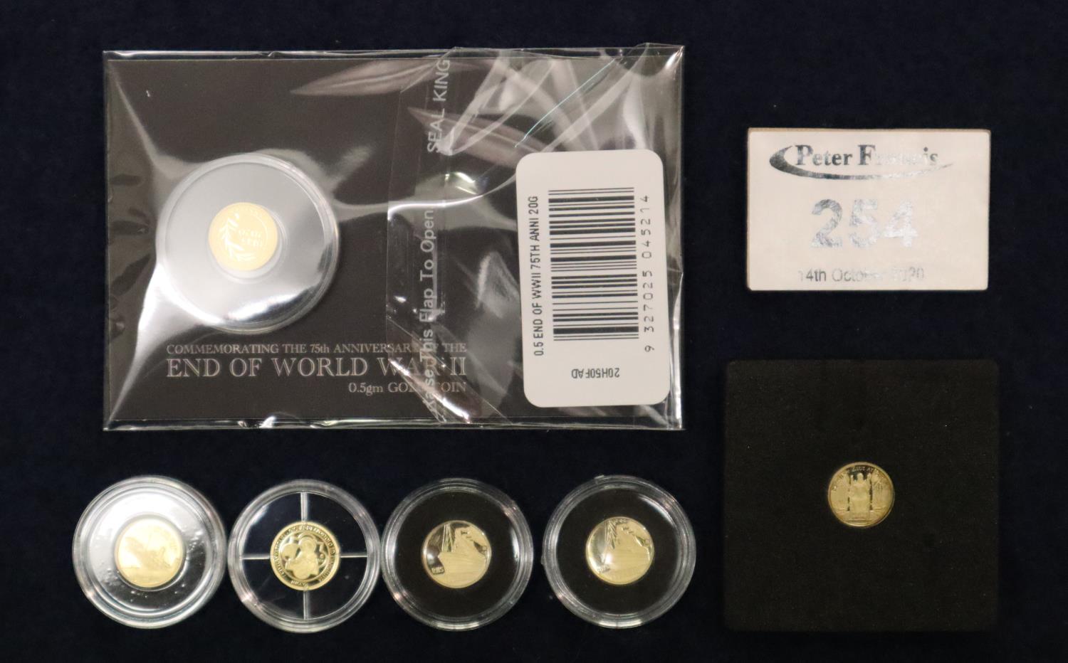 Collection of assorted tiny gold coins of a commemorative nature including; sinking of the Titanic