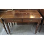 Edwardian mahogany side table having moulded top with two pull out drawers and brass loop handles,