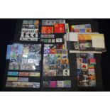 Great Britain selection of mint stamps, mostly sets, Presentation packs and various booklets.