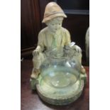 Plaster table top figure of a small boy looking into a goldfish bowl. (B.P. 21% + VAT)