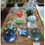 Collection of modern art glass paperweights, together with a baluster scent bottle, possibly