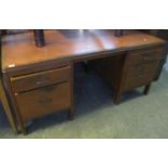 Early 20th Century mahogany solicitors type desk having leather inset top above two pedestals with