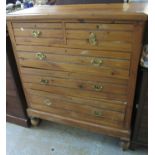 Edwardian pine straight front chest of two short and three long drawers on baluster turned feet. 105