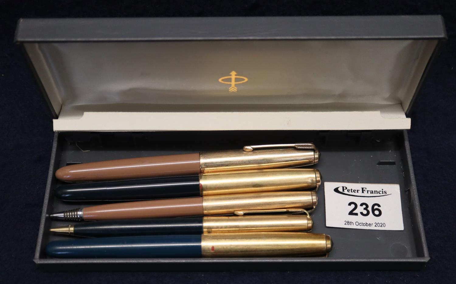 Collection of Parker writing instruments to include; three fountain pens with rolled gold caps and
