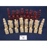 Chinese style resin chess set in two compartment wooden box . (B.P. 21% + VAT)