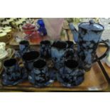 15 piece Ewenny pottery coffee set on a blue glazed ground. (B.P. 21% + VAT)