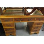 Reproduction yew wood twin pedestal writing desk. (B.P. 21% + VAT)