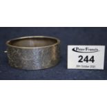 Victorian silver hinged and engraved bangle. (B.P. 21% + VAT)