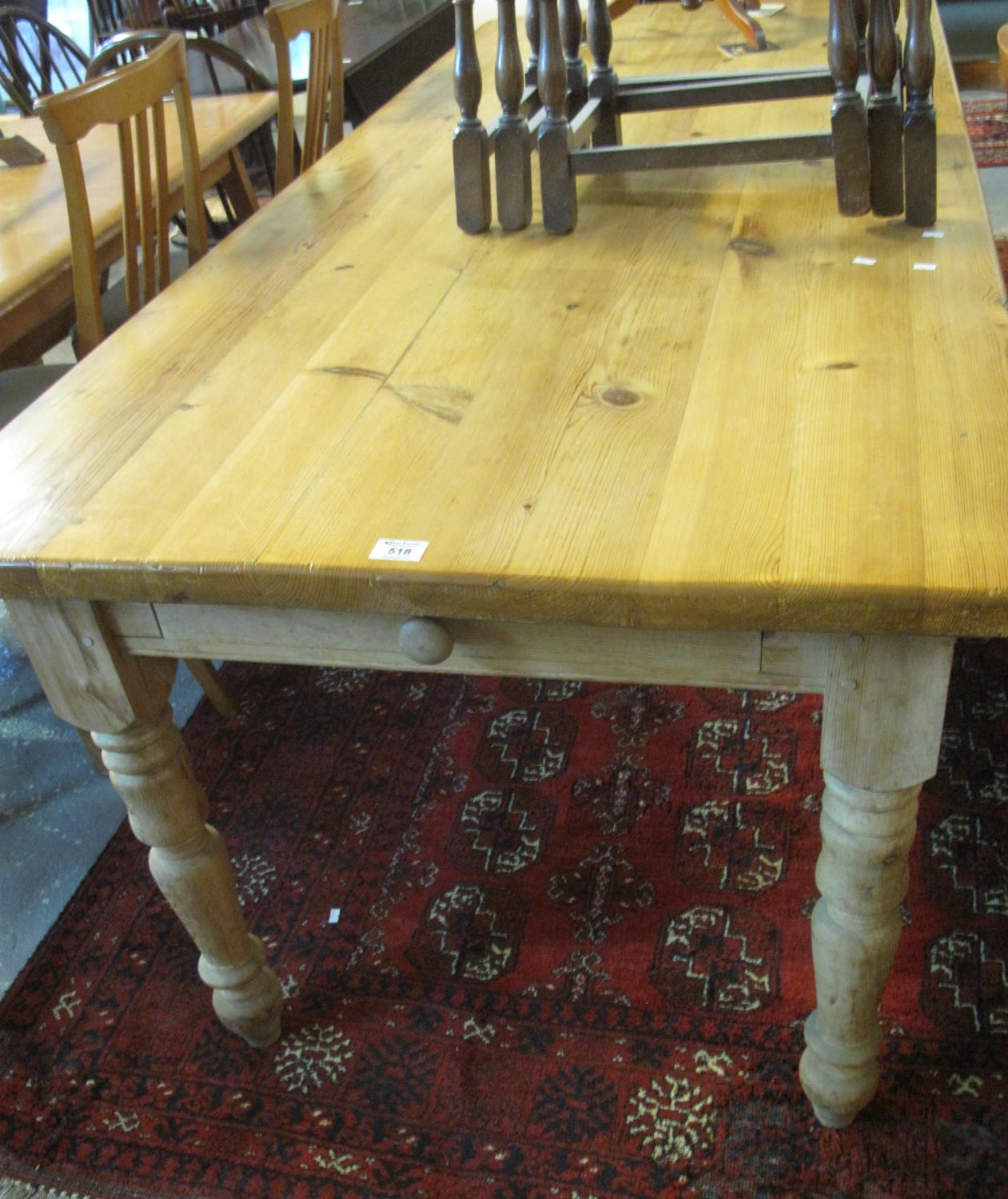 Large, modern pine farmhouse style kitchen table on turned supports. (B.P. 21% + VAT)