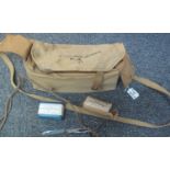 British military first aid pouch with contents, printed initials P.A.D. and crows foot mark. (B.P.
