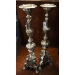 Pair of white metal ecclesiastical style pricket type baluster candlesticks, triangular scroll bases