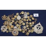 Bag of assorted military buttons, some cap badges etc. (B.P. 21% + VAT)