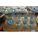 Seven piece blue glass lemonade set. (7) (B.P. 21% + VAT)