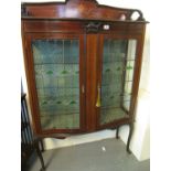 Edwardian mahogany inlaid bow fronted two door display cabinet on cabriole legs. (B.P. 21% + VAT)