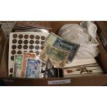 A large box containing empty coin wallets and coin folders, tin of mixed GB and foreign currency,