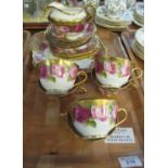 21 piece Royal Albert Crown china rose design part teaset. (B.P. 21% + VAT) Minor wear in places,