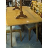 Mid century oak extending dining table on square tapering legs. (B.P. 21% + VAT)