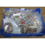 Blue tray with all world selection of stamps in large quantity of plastic packets. 1000's of stamps.