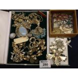 Jewellery case containing assorted enamelled and other costume jewellery items, together with a