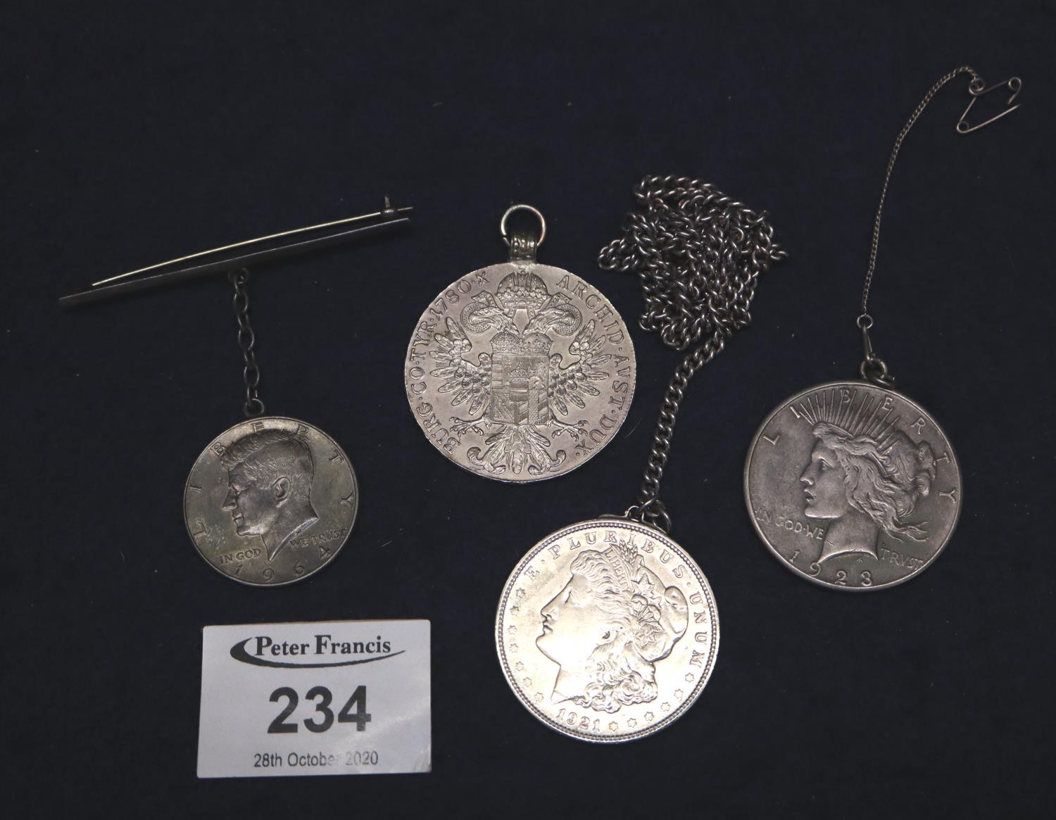 Maria Theresia silver thaler coin dated 1780 with pendant mount, an American 1928 silver dollar with