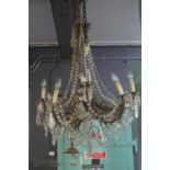 Gilt metal eight-branch chandelier light fitting overall with crystal droppers. (B.P. 21% + VAT)