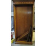 Edwardian style oak bookcase having moulded cornice with swag decoration above collection of