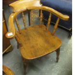 Early 20th century elm and beech spindle back smokers bow armchair. (B.P. 21% + VAT)