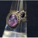 Yellow metal sapphire ring and a silver and amethyst ring. (B.P. 21% + VAT)