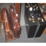Two brown vintage briefcases, together with two other modern briefcases. (B.P. 21% + VAT)