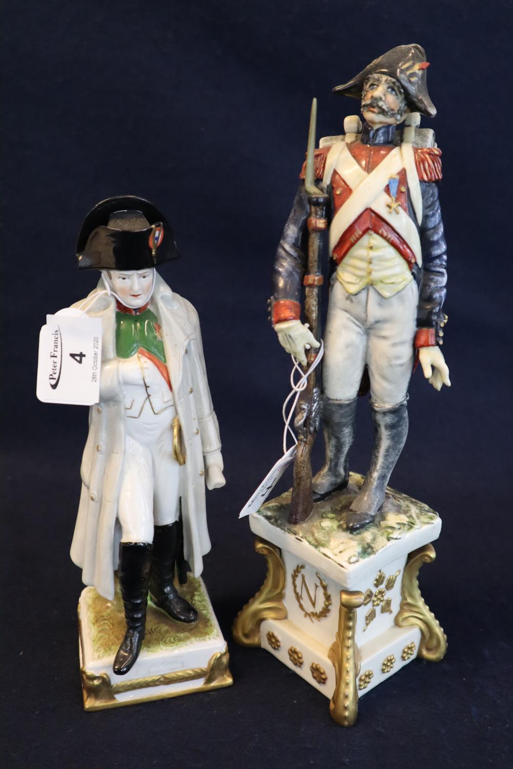 Two Continental porcelain military figurines, one of Napoleon Bonaparte, the other a Veteran