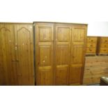 Collection of pine bedroom furniture to include; double wardrobe, triple wardrobe, pair of three