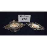 Two silver filigree brooches. (B.P. 21% + VAT)