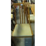 Four modern beech slat back dining chair with drop in seats. (4) (B.P. 21% + VAT)