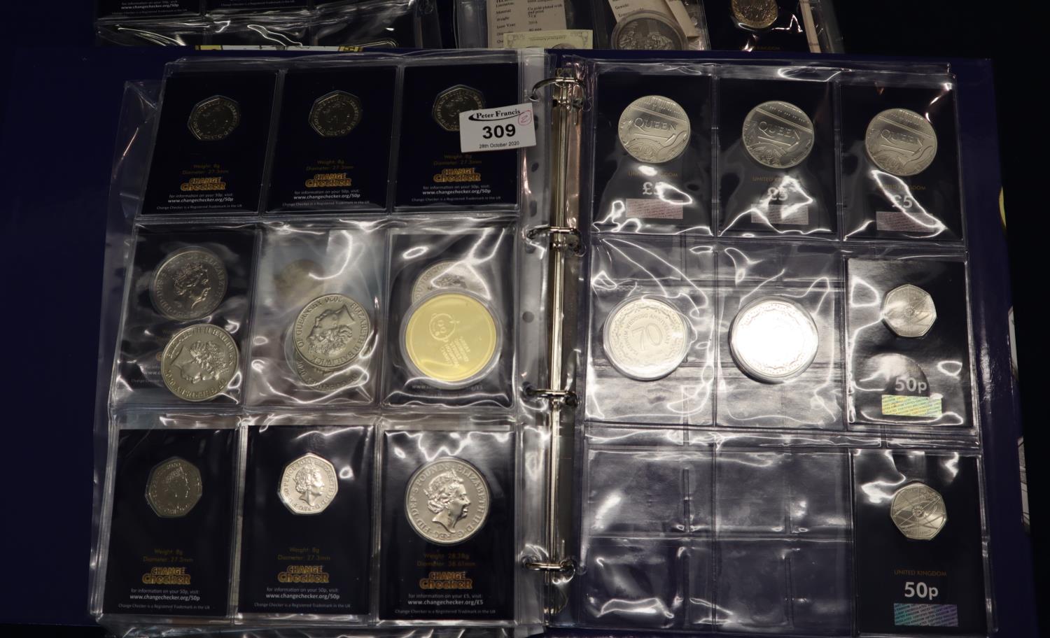 Two folders of modern coins and medallions, various, mostly cupronickel or silver plated. (2) (B.