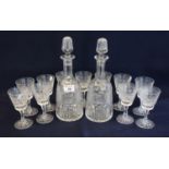 Pair of Brierley cut glass mallet shaped decanters and stoppers, together with a set of eleven