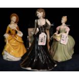 Three Royal Doulton bone china figurines to include; Classics in Vogue 'Amelia' HN4327, 'Clarissa'