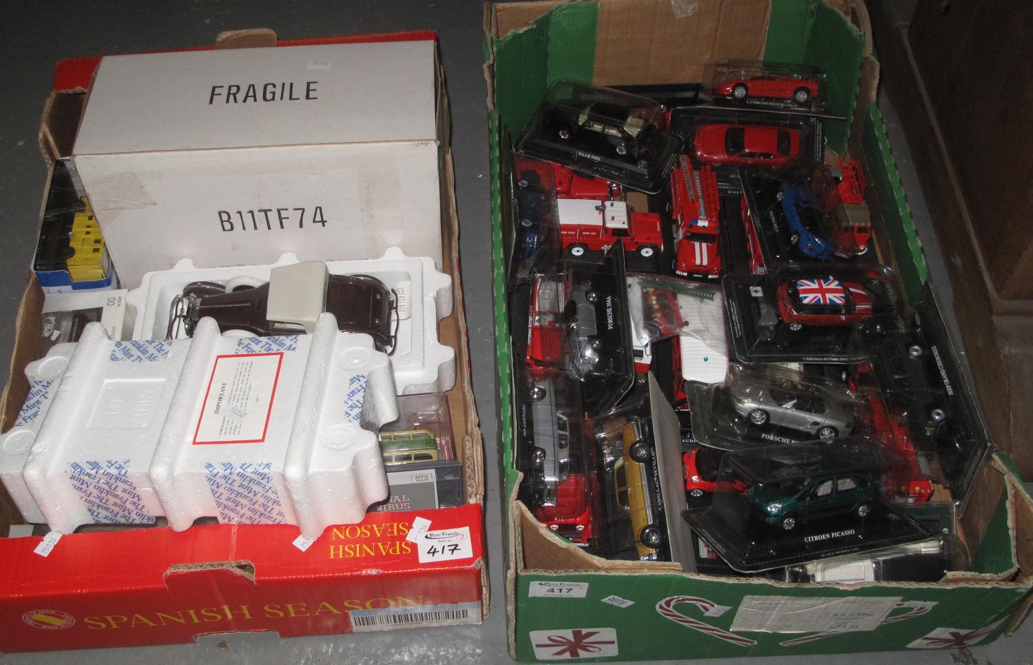 Two boxes of assorted diecast model vehicles in original packaging, exclusive first editions 00