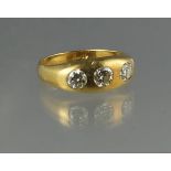 18CT GOLD THREE STONE DIAMOND RING. Estimated total diamond weight 1.2cts. Ring size M. Weight 10g