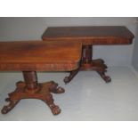 PAIR OF MID VICTORIAN MAHOGANY SIDE TABLES having shaped top above wrythen pedestal and standing