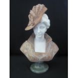 AFTER THE VICTORIAN ORIGINAL BUST of a young woman in a feather hat, white, rouge and grey marble.