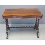 MID VICTORIAN ROSEWOOD STRETCHER TABLE having moulded and shaped top, above barley twist supports