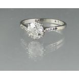 PLATINUM AND DIAMOND SOLITAIRE RING. The old cut diamond an estimated 1.18ct. Ring Size O. Weight