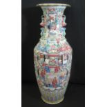 19TH CENTURY CHINESE CANTON PORCELAIN FAMILLE ROSE VASE having flared neck above painted panels of