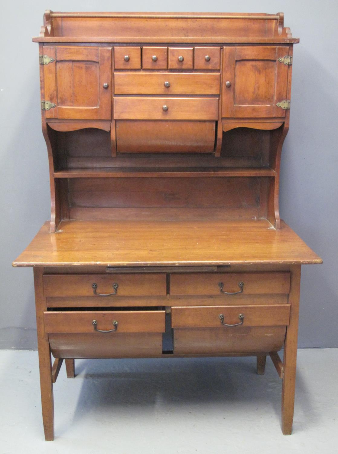 EARLY 20TH CENTURY DUTCH MAHOGANY KITCHEN CABINET having shaped gallery top above an arrangement