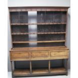 EARLY 19TH CENTURY WELSH OAK POT BOARD DRESSER having moulded cornice above iron hooks and
