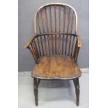 19TH CENTURY ASH AND ELM WINDSOR ARMCHAIR having moulded seat, standing on turned supports and