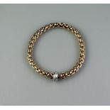 18CT GOLD FOPE FLEX' IT BRACELET with white gold diamond set charm. Weight 23.4g approx. (B.P. 21% +