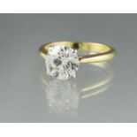 18CT GOLD 2.50CT DIAMOND SOLITAIRE RING. The brilliant cut diamond in four claw setting. Together