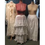 A 19TH CENTURY COTTON NIGHTGOWN with lace ruffle collar and cuffs, a sheer cotton tiered embroidered