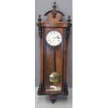 LATE 19TH/EARLY 20TH CENTURY WALNUT AND EBONISED CASE SINGLE TRAIN VIENNA TYPE WALL CLOCK having